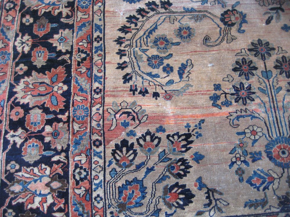 19th Century Sarouk carpet with a typical all-over floral design on a brick red field with multiple - Image 7 of 7