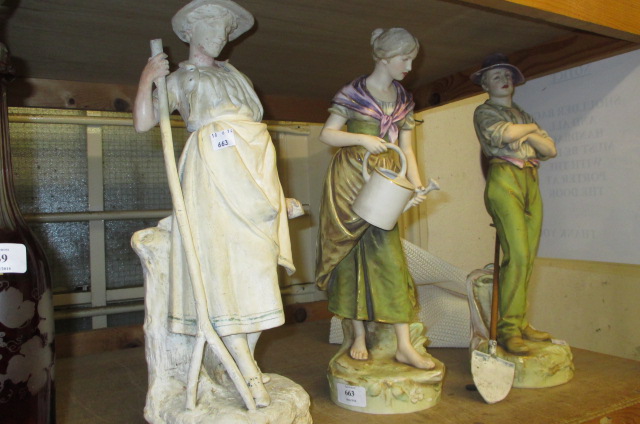 Pair of large Royal Dux figures of lady and gentleman gardeners (a/f), 17ins high approximately,