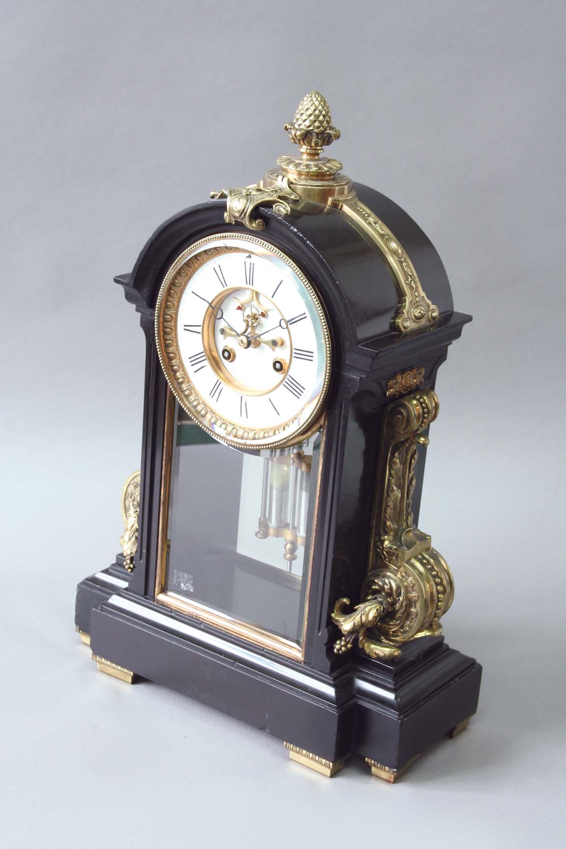 A BLACK SLATE TABLE REGULATOR dial white enamel with exposed jewel escapement, movement drum,