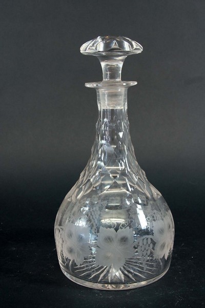 A PAIR OF DECANTERS AND STOPPERS each mallet-shape body with lozenge-cut neck and shoulders and