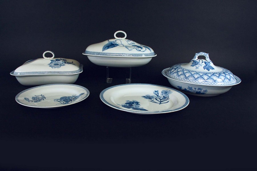 A WEDGWOOD PART DINNER SERVICE each piece printed with bold floral specimens, comprising: one