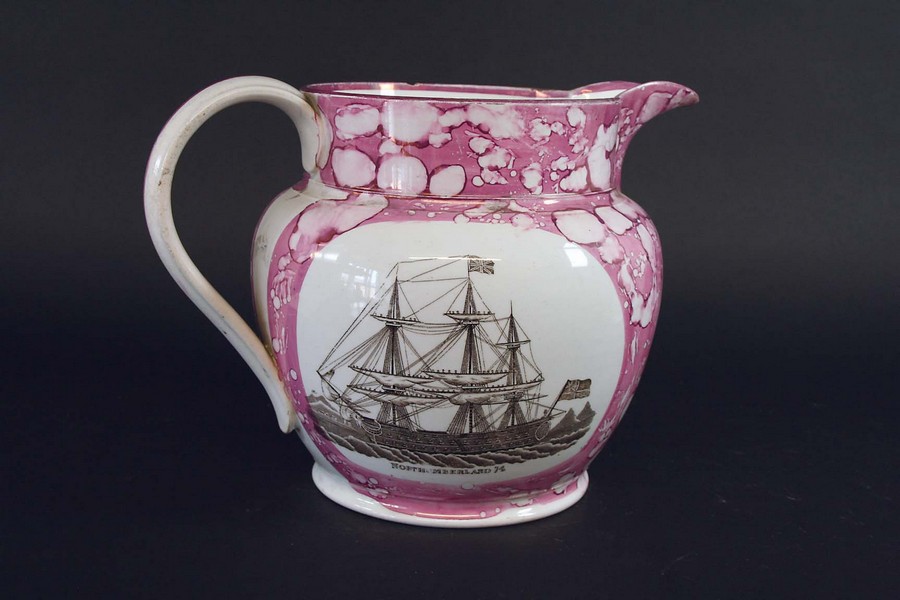 A LARGE PINK LUSTRE JUG printed with a named warship, Northumberland 74, and two verses, one printed