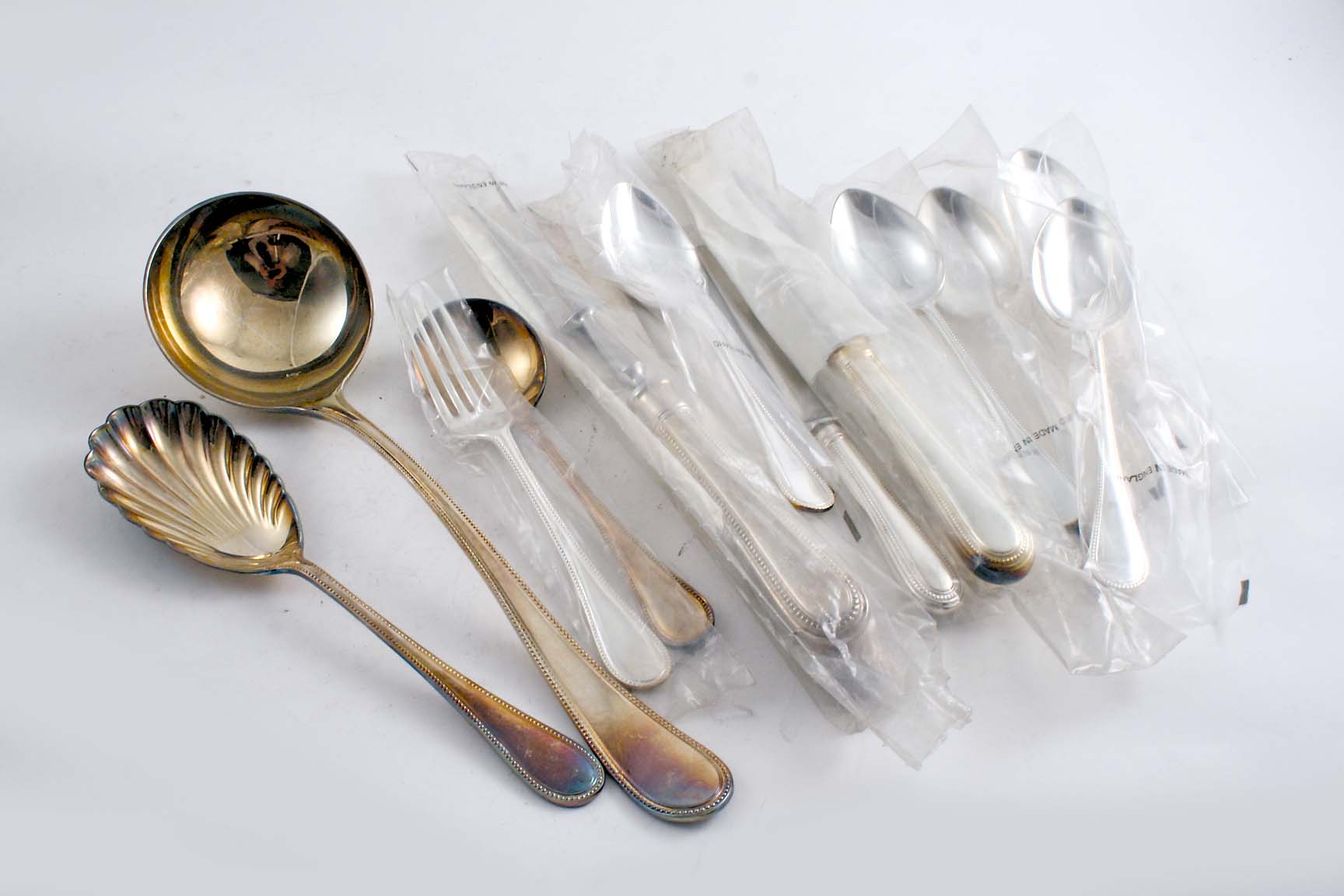 A QUANTITY OF MODERN ELECTROPLATED FLATWARE & CUTLERY Old English Bead pattern, the majority by