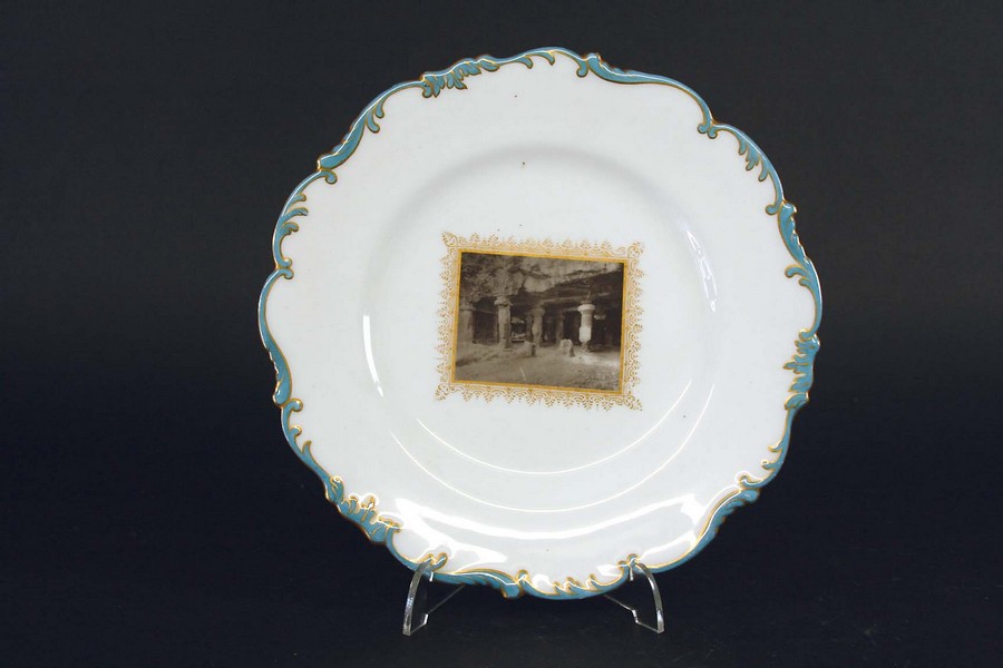 A SET OF FIFTEEN CAULDON PLATES each with a central photograph of a named Indian view, within a gilt