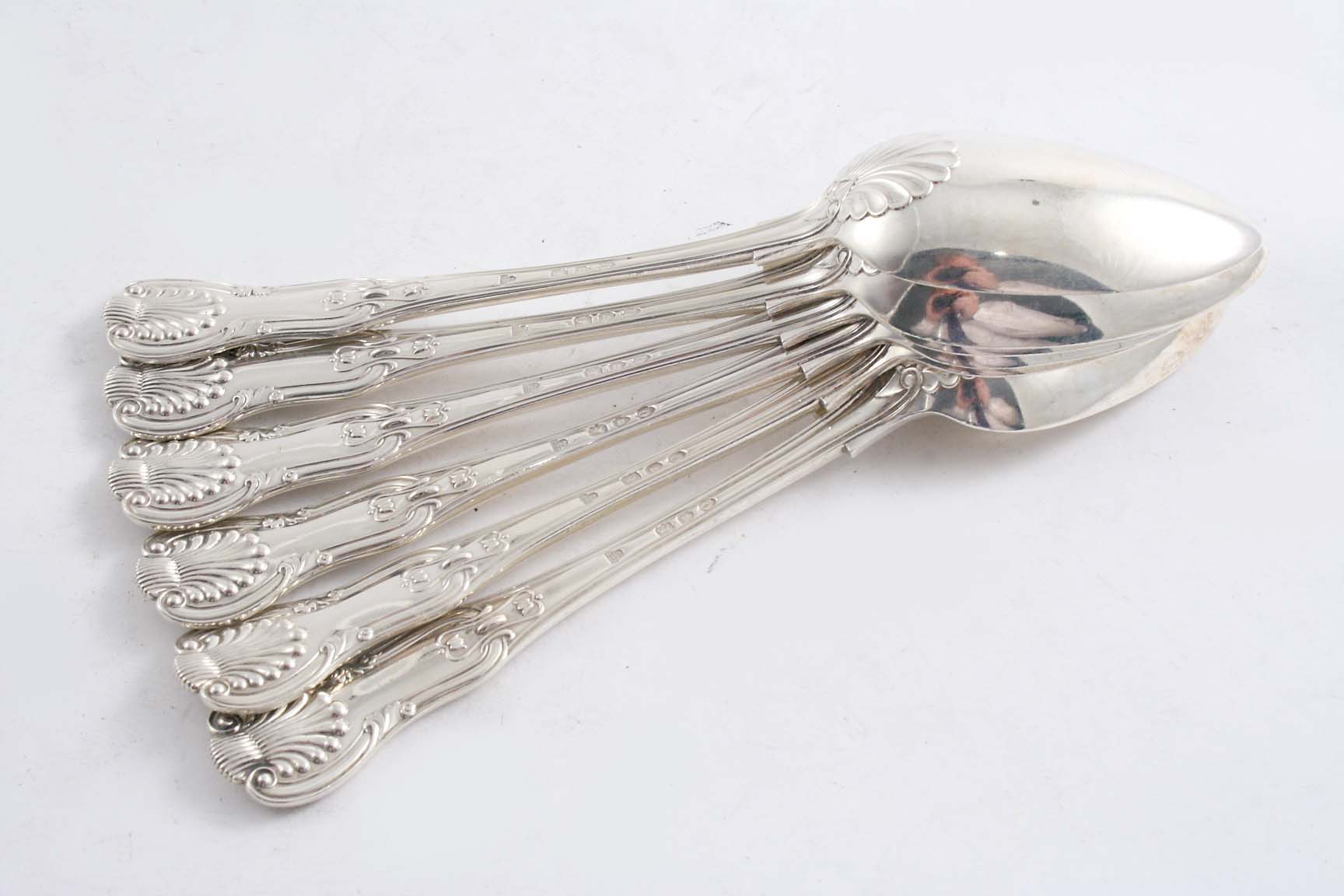 A SET OF SIX LATE VICTORIAN HOURGLASS PATTERN TABLE SPOONS (diamond shell heel), crested, by Francis