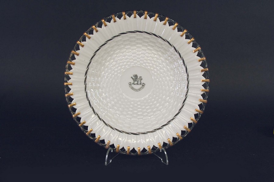 A BELLEEK DESSERT SERVICE each piece printed with a crest and motto Alis Aspicit Astra,