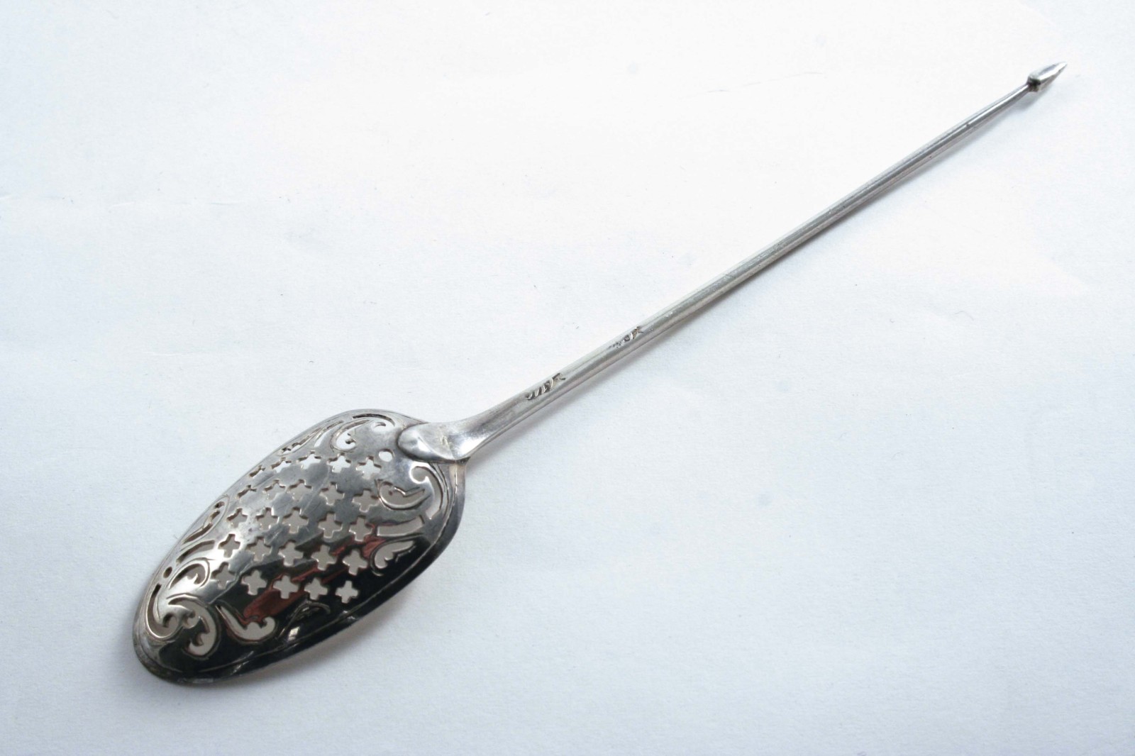 A GEORGE III MOTE SPOON with a diamond point finial & a single drop, initialled "S", the bowl