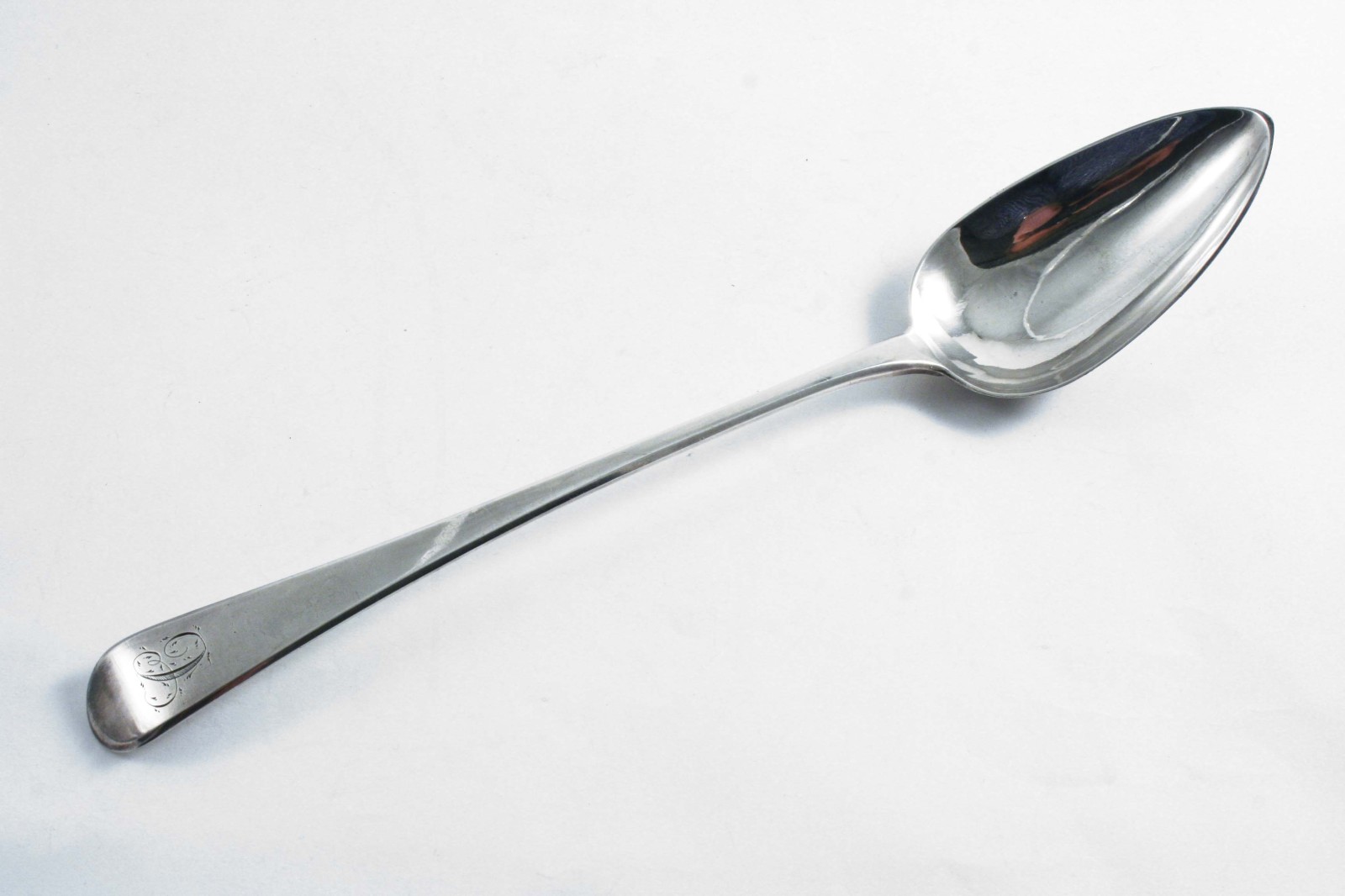 A GEORGE III OLD ENGLISH PATTERN BASTING OR SERVING SPOON initialled "C", by Peter & William
