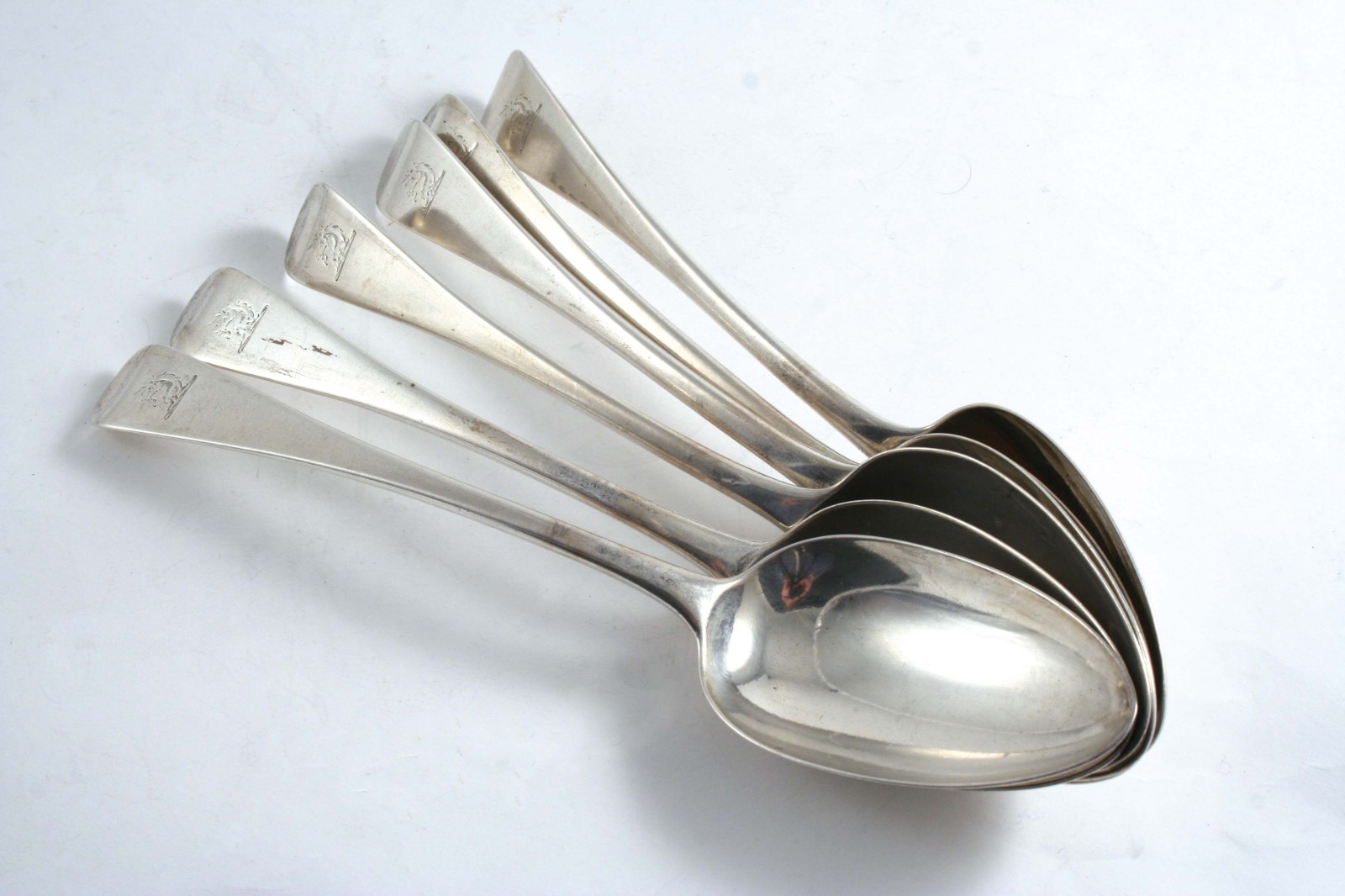 A SET OF SIX GEORGE III OLD ENGLISH PATTERN TABLE SPOONS crested, by William Eley & William Fearn,