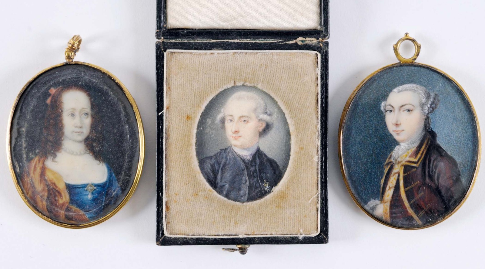 FRENCH SCHOOL C.1780 Miniature portrait of a gentleman wearing black with a medal, on ivory, 3.5 x 3