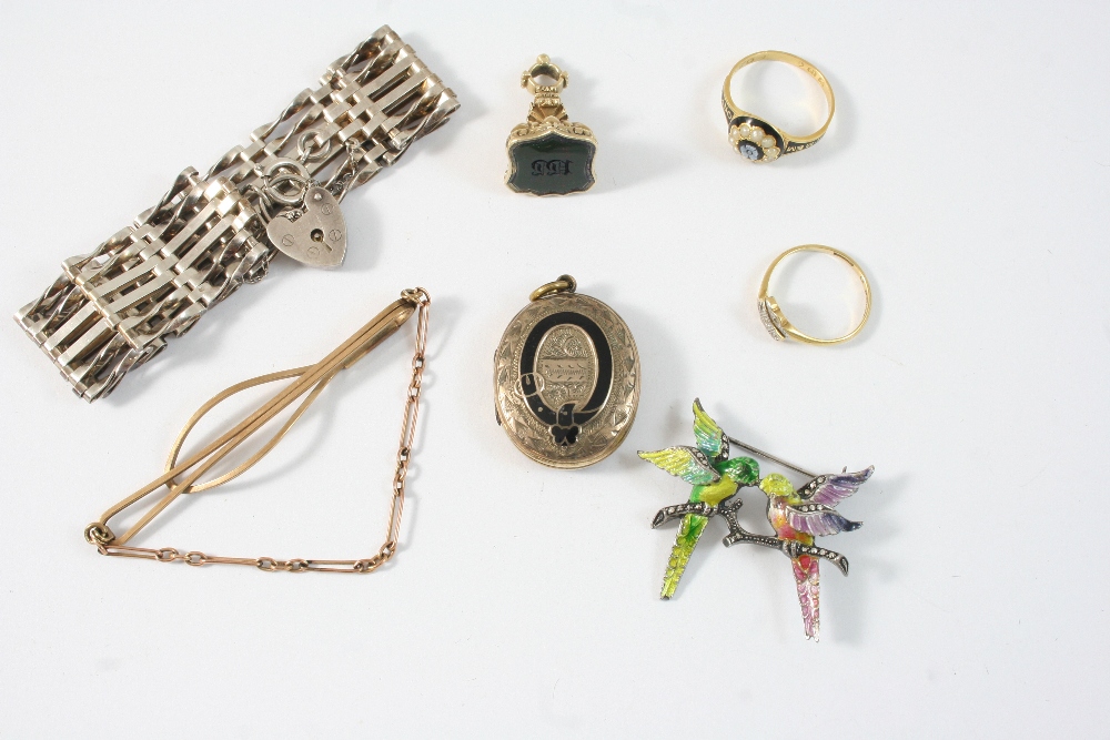 A QUANTITY OF JEWELLERY including a Victorian enamel, pearl and 18ct. gold memorial ring, a gold