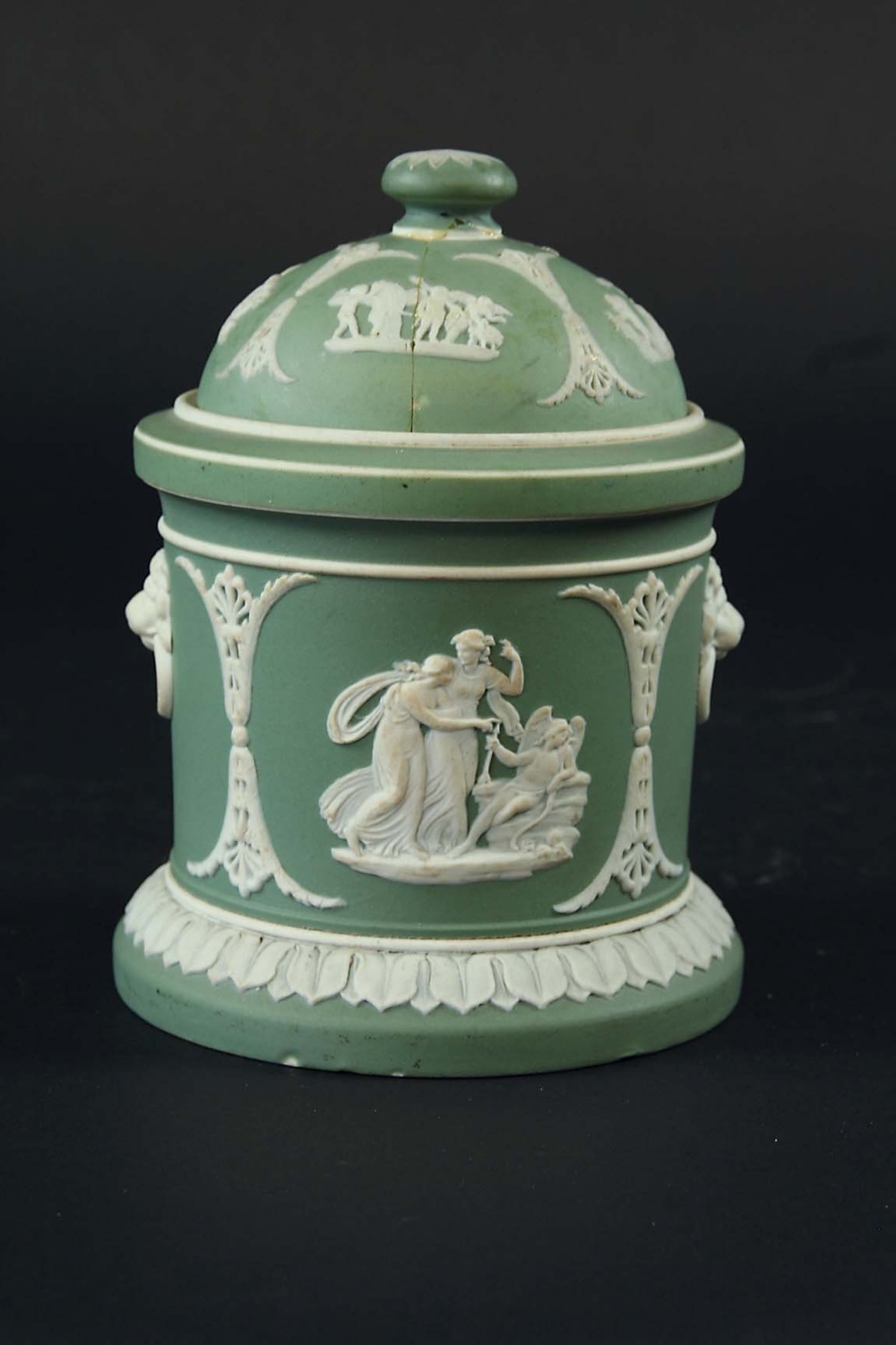 A WEDGWOOD GREEN JASPER JAR AND COVER spigged with white classical motifs, impressed mark and