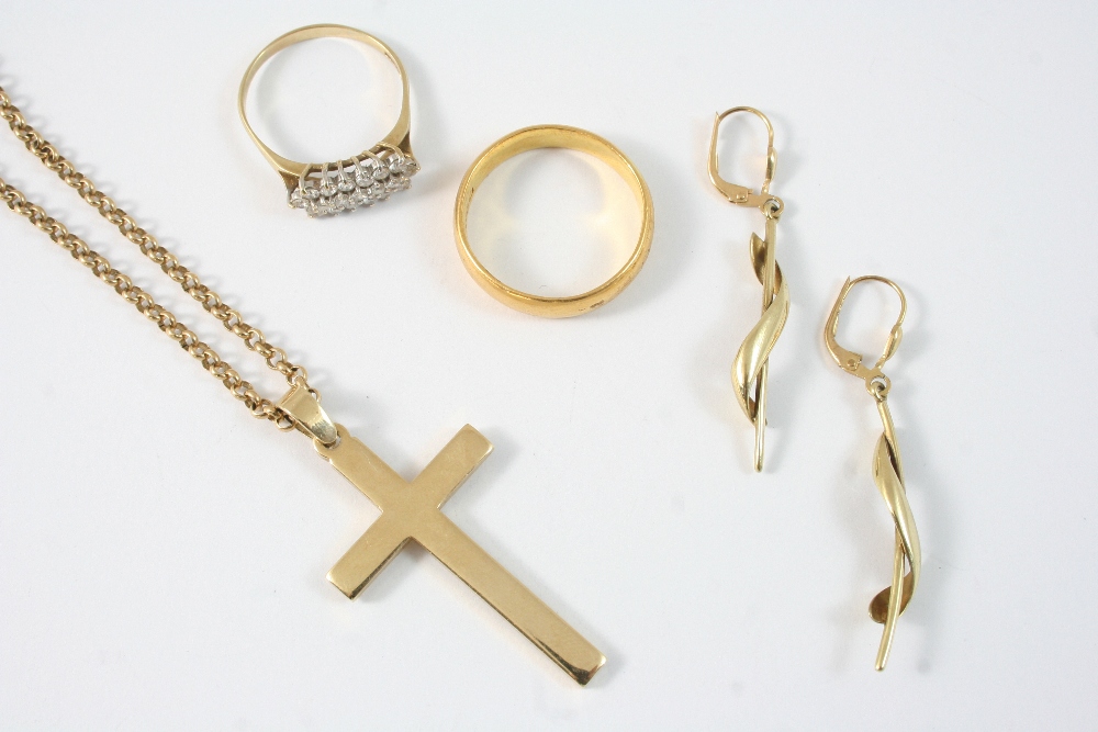 A 9CT. GOLD CRUCIFORM PENDANT 4 x 2.5cm., on a 9ct. gold chain, total weight 16 grams, a 22ct.