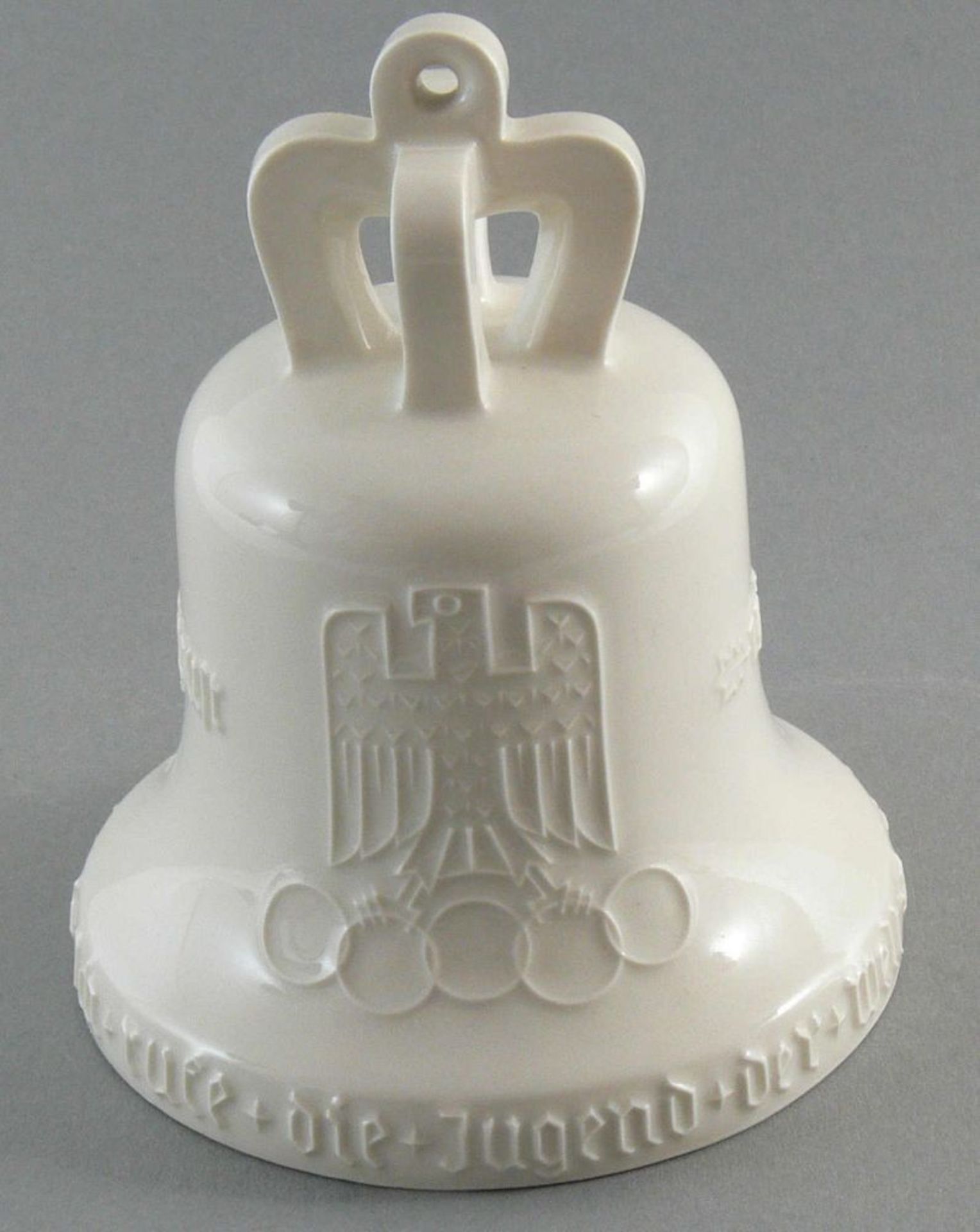 Eine seltene Porzellan Glocke, Olympische Spiele 1936 in Berlin mit der Aufschrift "Ich rufe die