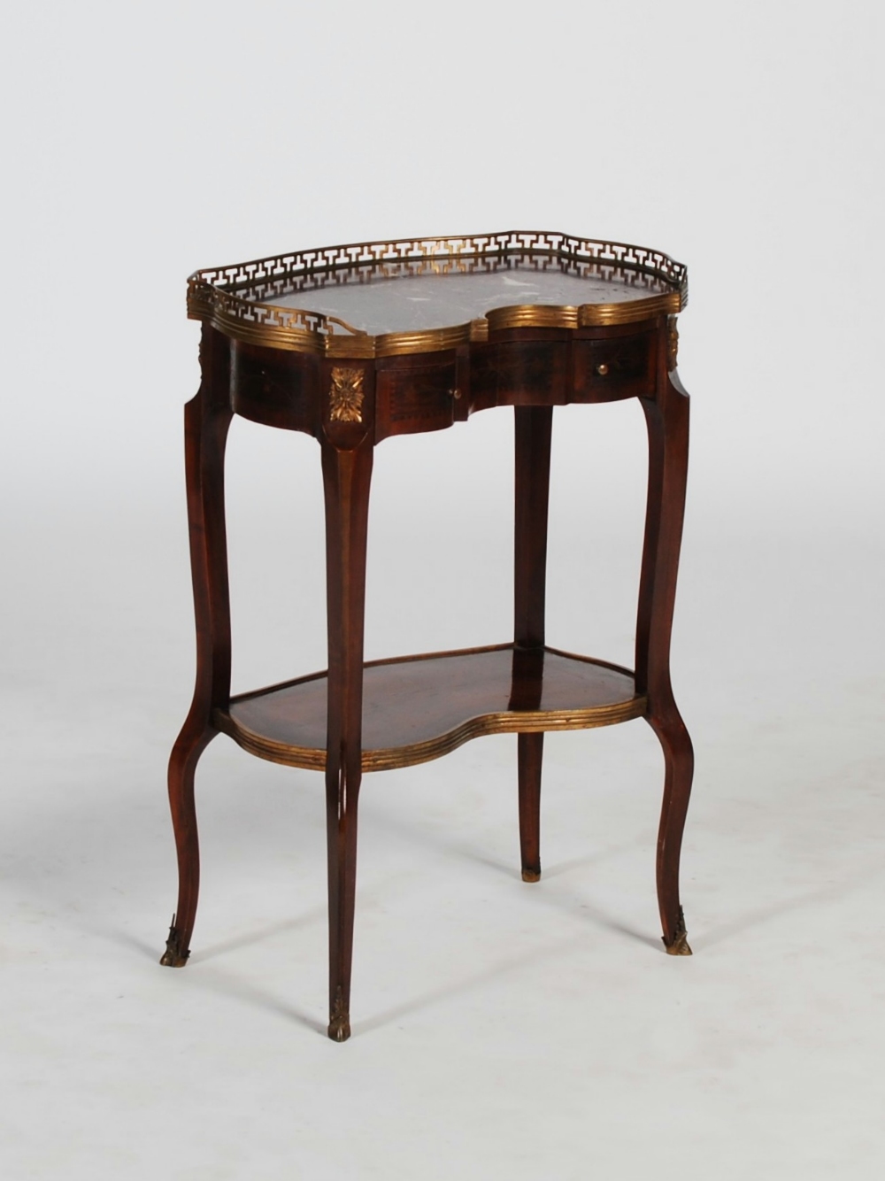 A Continental kingwood, marquetry and gilt metal mounted occasional table, the mottled purple and