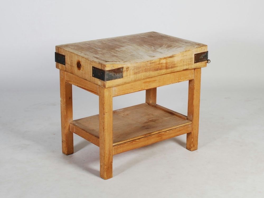 A 20th century pine and iron bound butchers block, the detachable rectangular block with a hanging