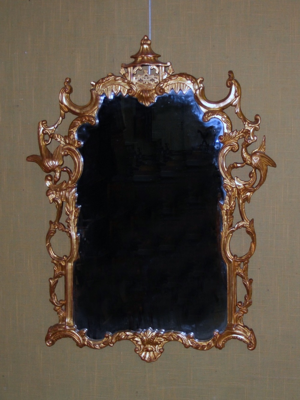 A 20th century George III style gilt wood wall mirror, in the Chinese Chippendale taste, 135cm