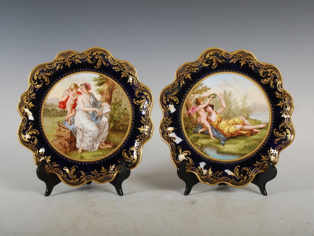 A pair of Vienna cobalt blue ground cabinet plates, signed C. Weh, decorated with hand painted