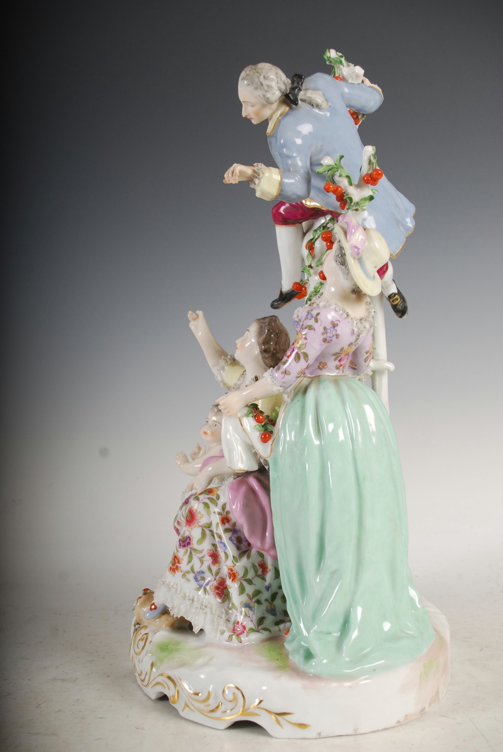 A pair of Meissen style porcelain figure groups, one modelled with lady on a swing with attendants - Image 7 of 12