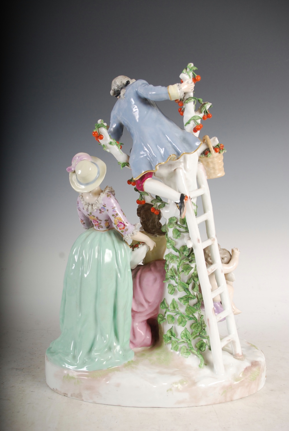 A pair of Meissen style porcelain figure groups, one modelled with lady on a swing with attendants - Image 8 of 12