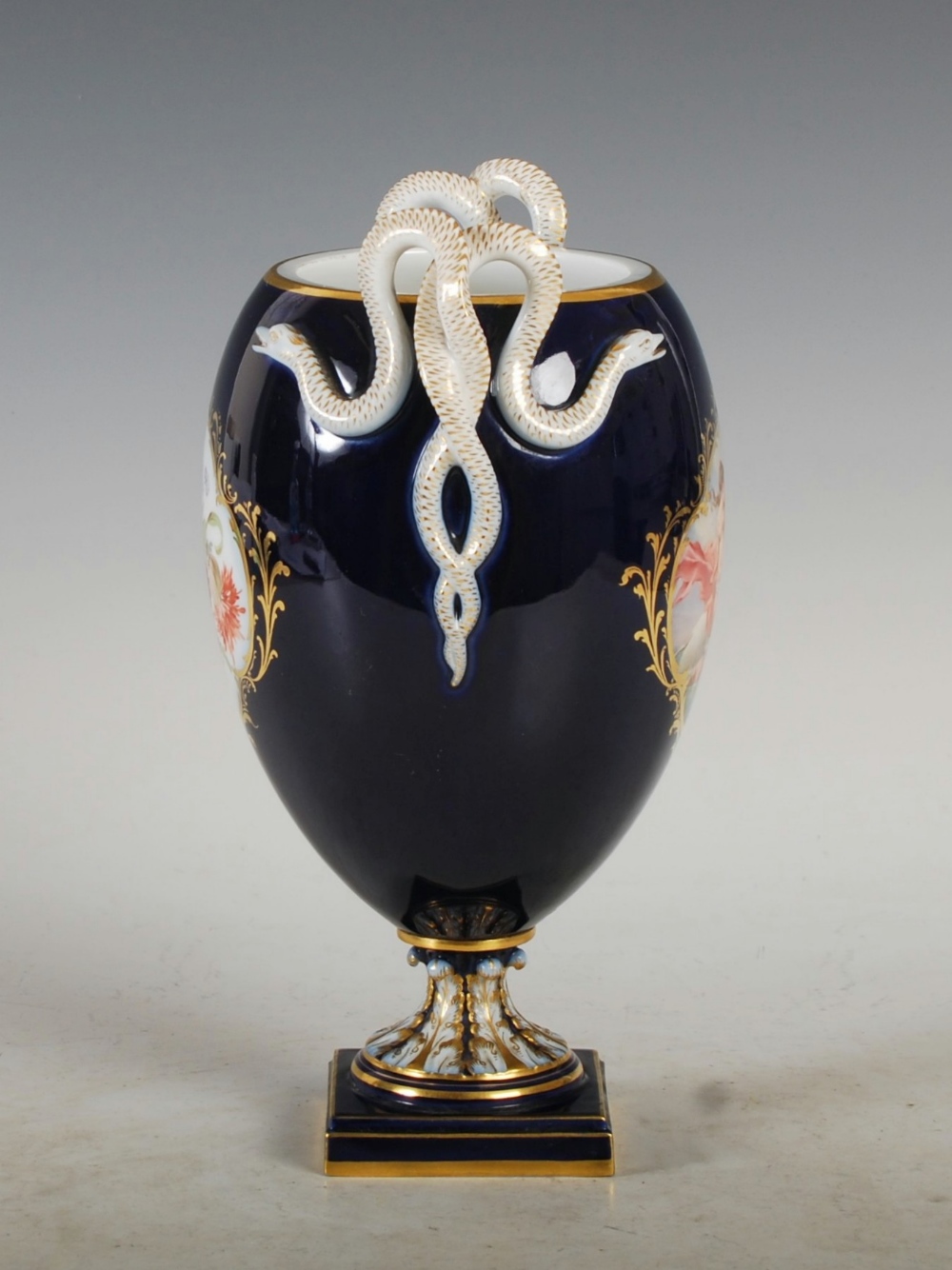 A Meissen cobalt blue ground twin handled urn, decorated with painted panels of colourful flowers, - Image 4 of 7