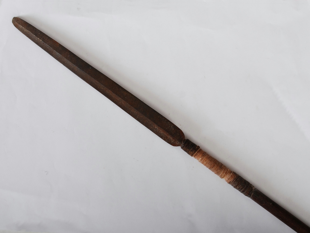 A late 19th century African Tribal spear, with a long tapered double edged blade, woven binding and - Image 2 of 6