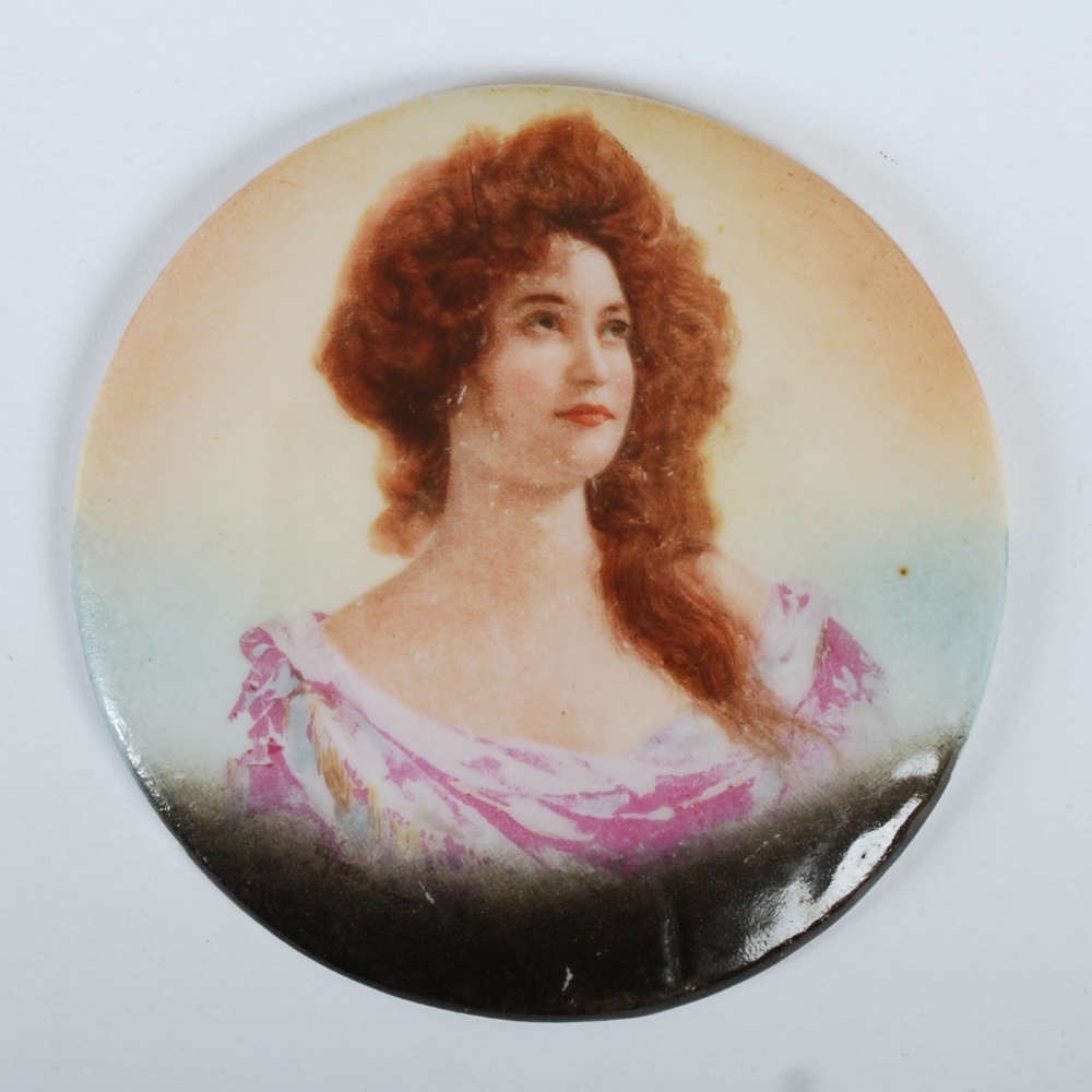 A late 19th century Continental porcelain circular panel, printed and over painted with the bust of