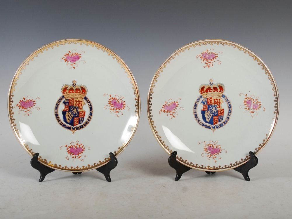 A pair of Samson Armorial plates, decorated in the Chinese famille rose style with faux armorials