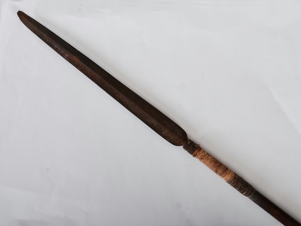 A late 19th century African Tribal spear, with a long tapered double edged blade, woven binding and - Image 3 of 6