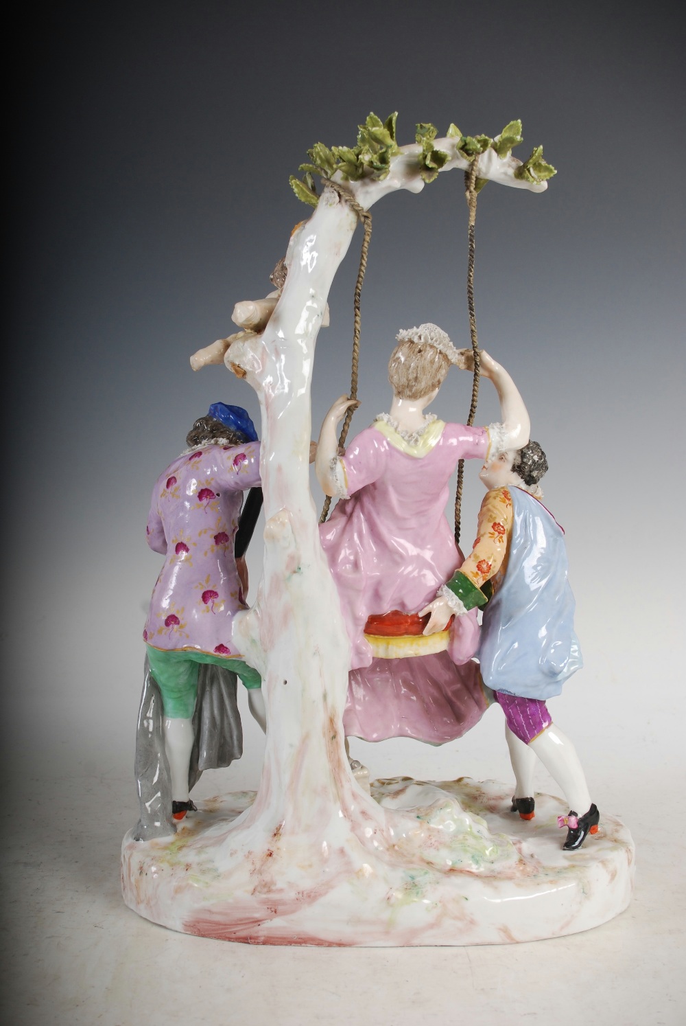 A pair of Meissen style porcelain figure groups, one modelled with lady on a swing with attendants - Image 12 of 12