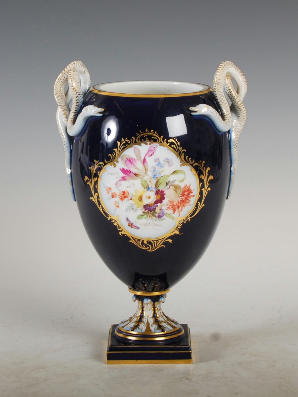 A Meissen cobalt blue ground twin handled urn, decorated with painted panels of colourful flowers, - Image 3 of 7