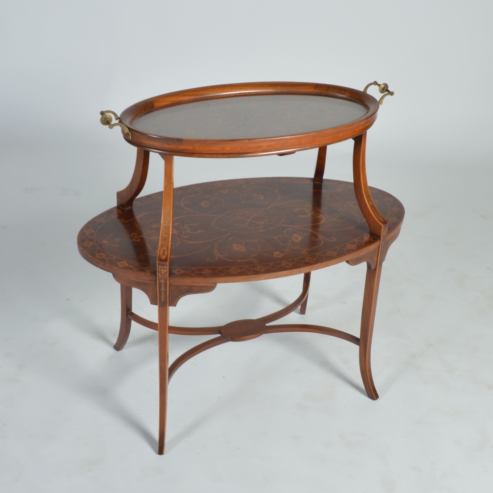 An Edwardian mahogany and marquetry tray top etagere, the oval upper tier with a detachable glass
