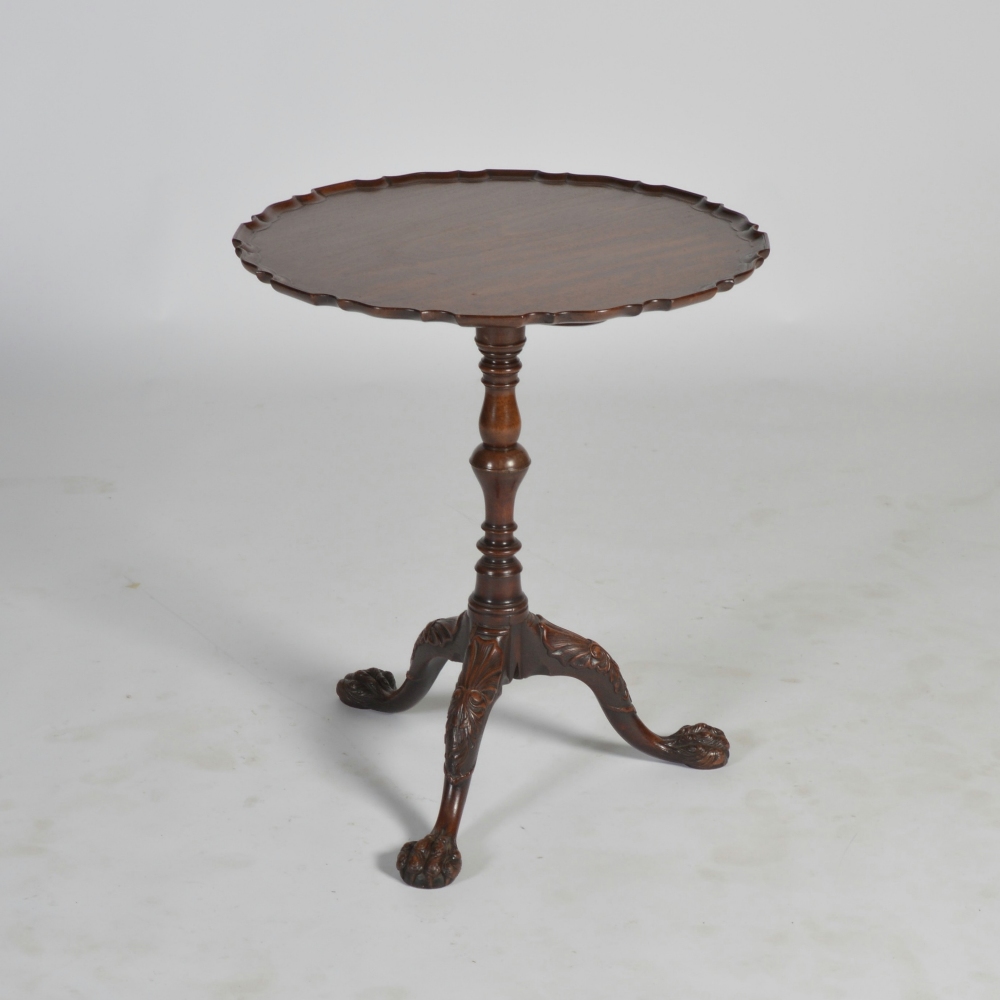 A 19th century mahogany snap top occasional table, possibly Irish, the circular top with a scalloped