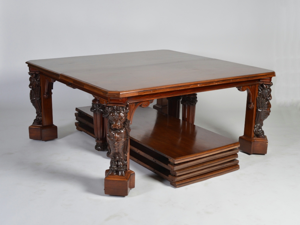 A fine Victorian mahogany extending dining table, the rectangular top with a moulded edge and canted