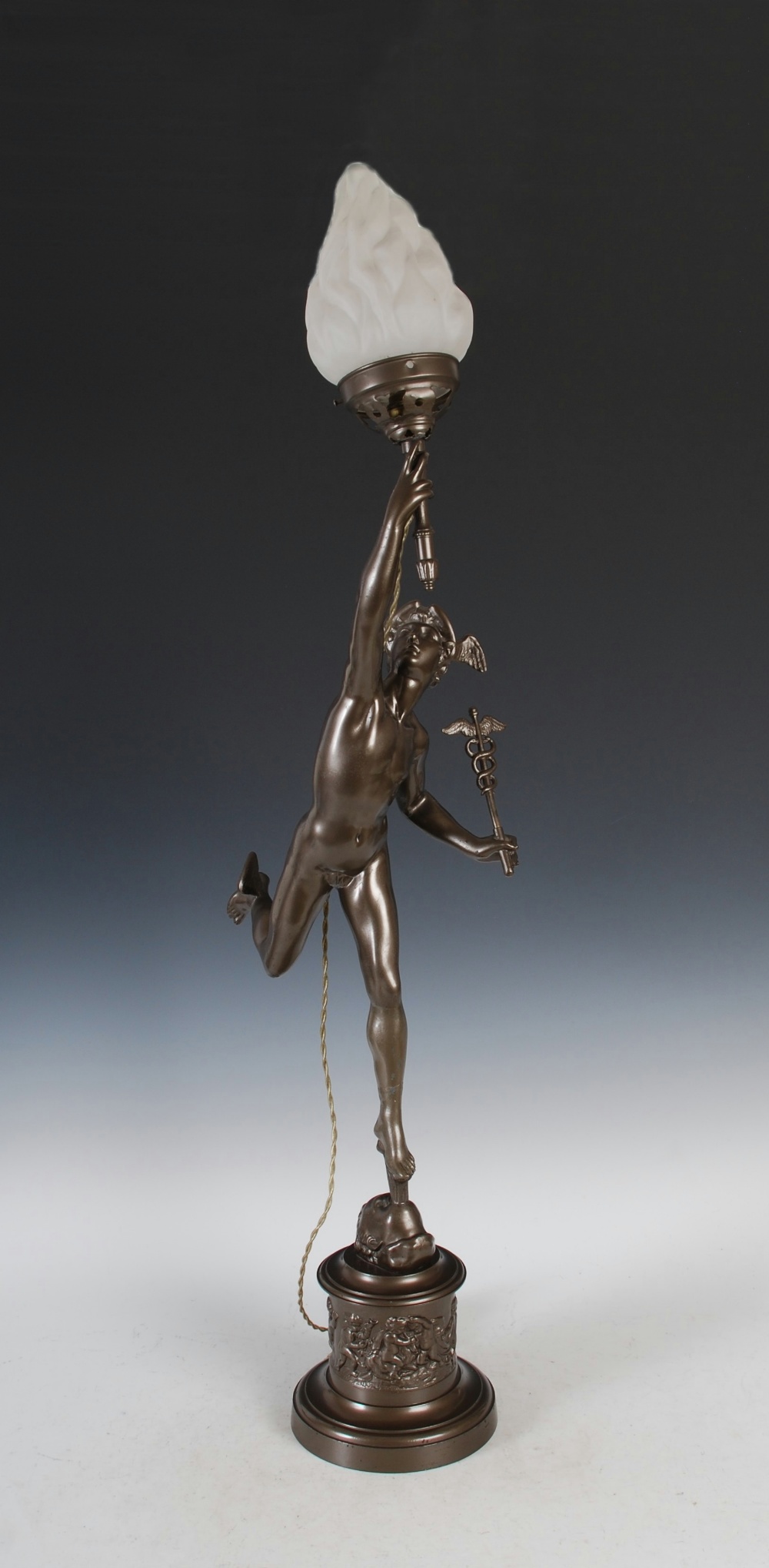A bronzed spelter figure of Mercury after Giambologna, converted to accommodate a light fitting