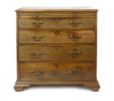 A George III mahogany chest of drawers, the cross banded top above a brushing slide and four