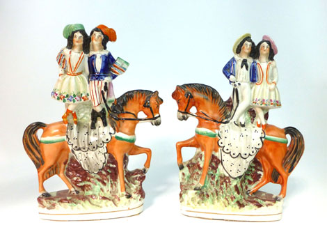 A Staffordshire equestrian figural group modelled as Andrew Ducrow and Luisa Woolford, h. 26 cm, (