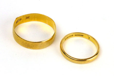 Two 22ct yellow gold plain wedding bands, approx. 5.5 gms, ring sizes T and L