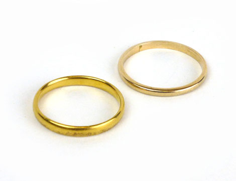 A 22ct yellow gold wedding band, approx. 2 gms, ring size N/O and a yellow metal wedding band