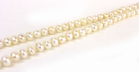 A single strand cultured pearl necklace with metalware clasp