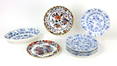 An early 20th century Meissen-style part service, blue decorated in an onion-style pattern