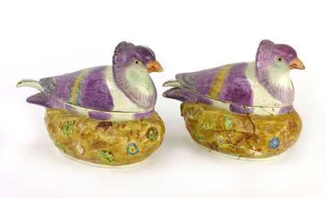 A pair of early 19th century Staffordshire pearlware pigeon or dove sauce tureens, covers and