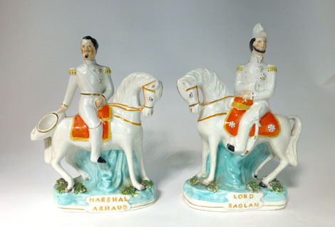 A pair of Staffordshire equestrian figures titled 'Lord Raglan' and 'Marshall Arnaud', max  h. 28 cm