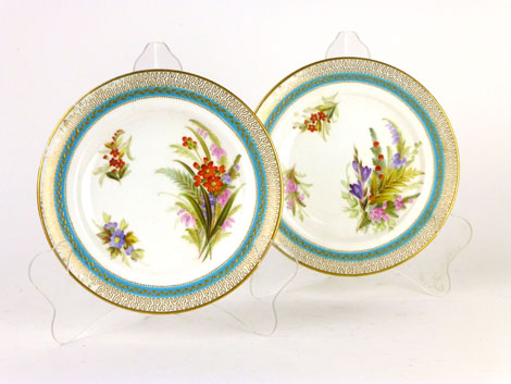A pair of Royal Worcester plates circa 1852 - 1862, Kerr and Binns period, painted with a central