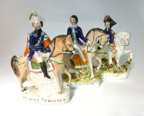 A Staffordshire equestrian figure titled 'Prince Prussia', h. 32 cm, another titled 'Prince Louis of