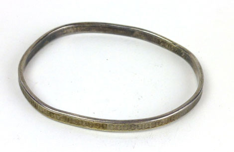 A silver engine turned bracelet by Charles Horner, Chester (?)1946   CONDITION REPORT:  Poor, mis-