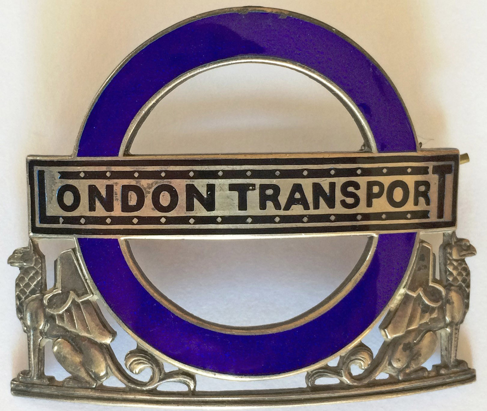 London Transport Bus Inspector's hallmarked silver CAP BADGE of the first type, with a navy blue