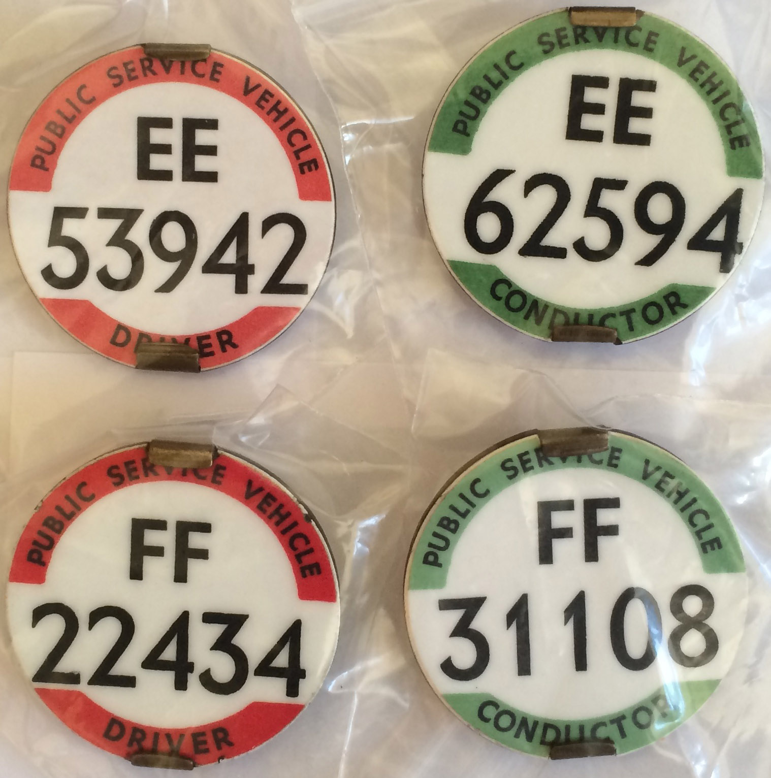 Sets of bus Driver's and Conductor's PSV BADGES for the East Midland & Eastern (EE & FF) Regions