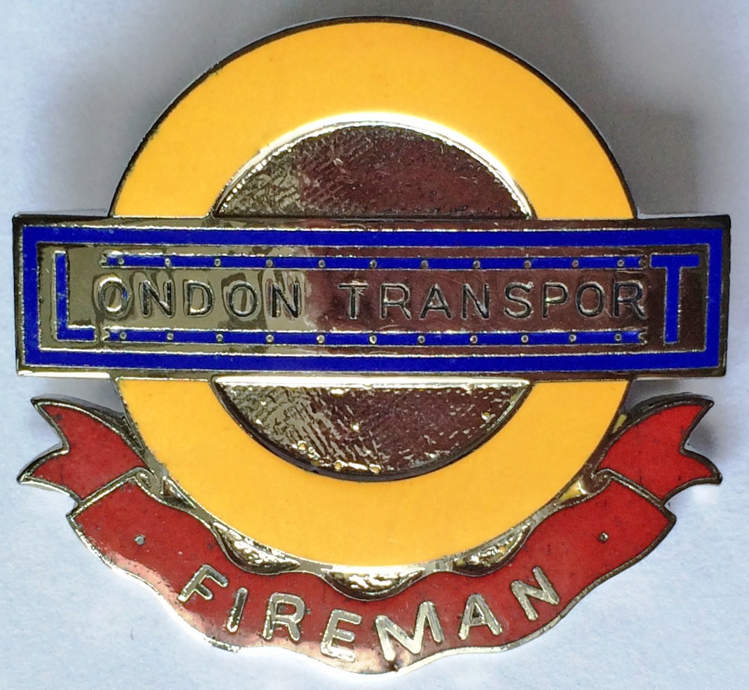 London Transport Underground "Fireman" CAP BADGE issued to staff responsible for installation of