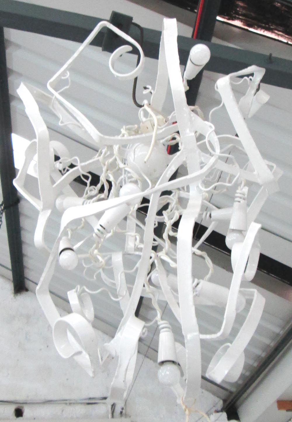 CHANDELIER, white painted metal of abstract form, 88cm H x 66cm W.